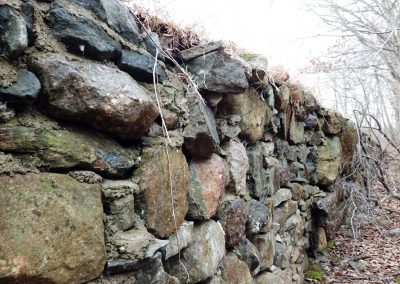 Rock wall side of a dam