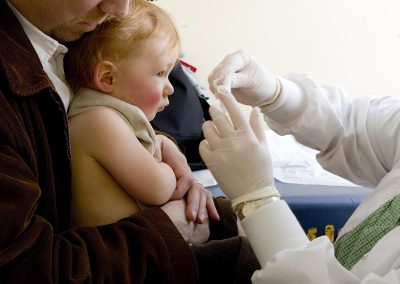 nervous infant child being vaccinated