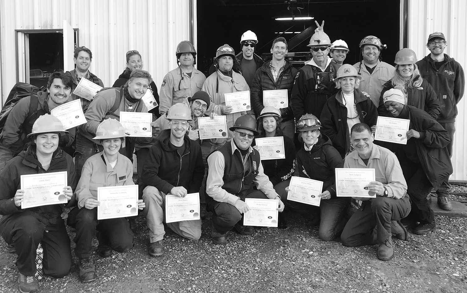 a black and white class photo of a training class