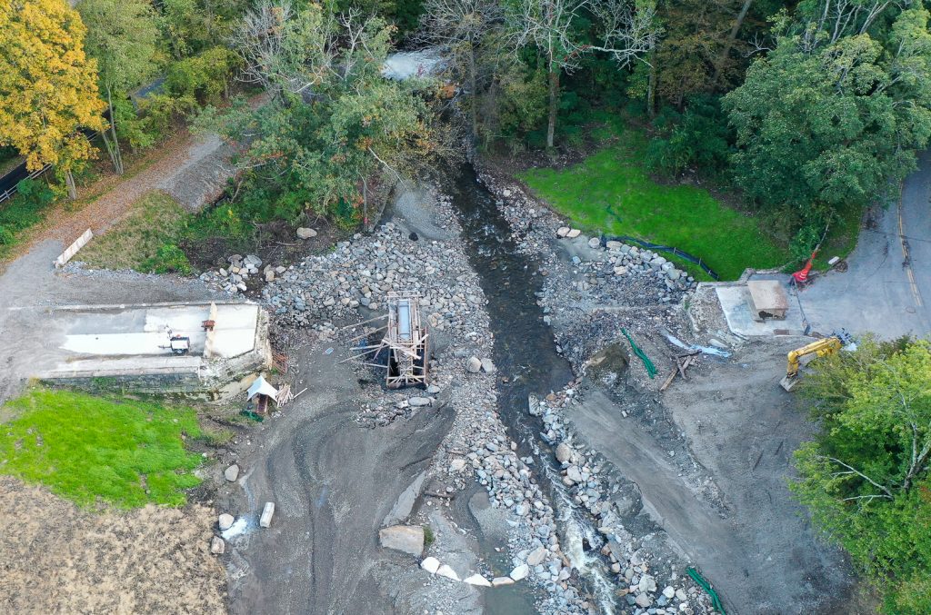 Aerial view of the demolition site of a dam on the Saw Mill River in Westchester County, NY